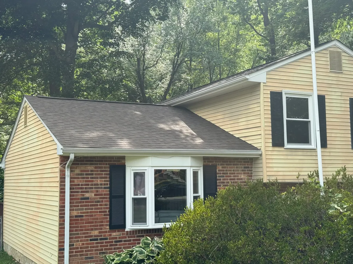 Roof replacement integrated with new siding