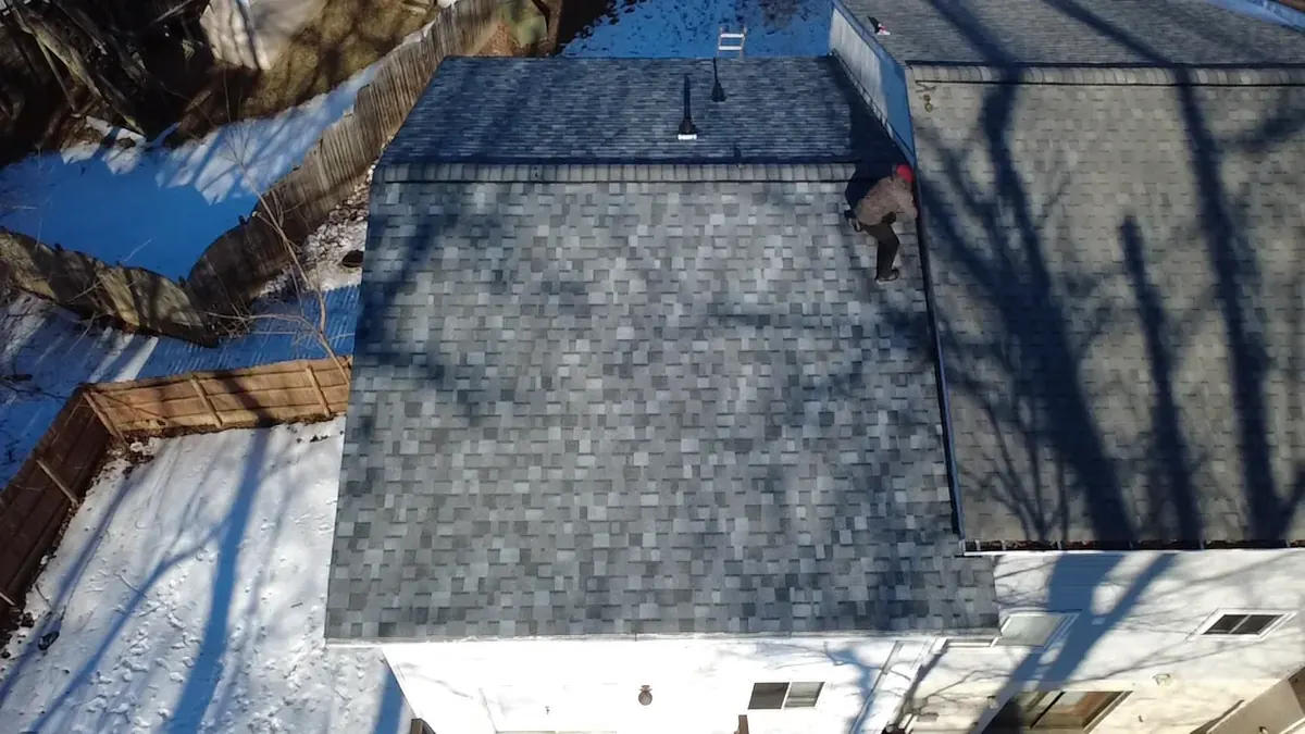 Completed architectural shingle roof installation on a Fredericksburg-area home
